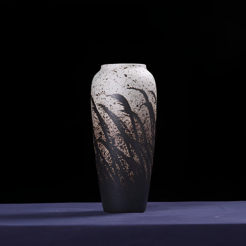 Handmade tall monochrome glazed ceramic vase with hand-painted leaf details for home decor