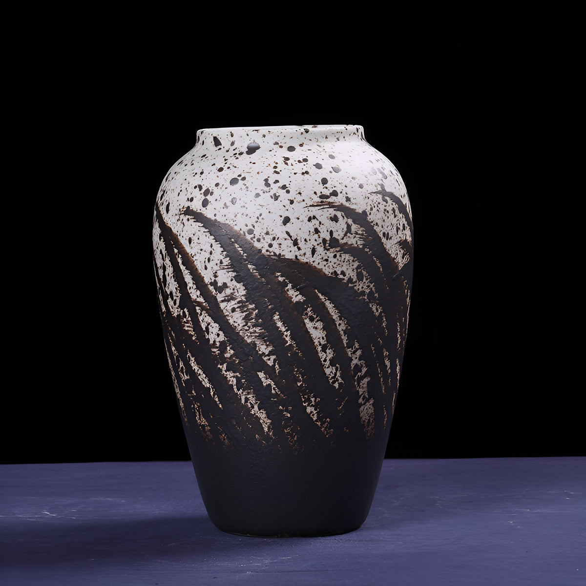 Modern oval glazed porcelain ceramic vase with hand-painted leaf details