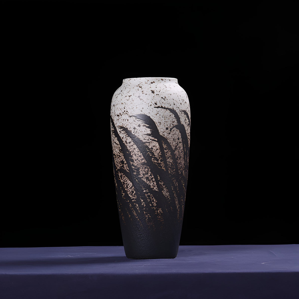 Minimalist slender glazed porcelain ceramic vase with hand-painted leaf accent